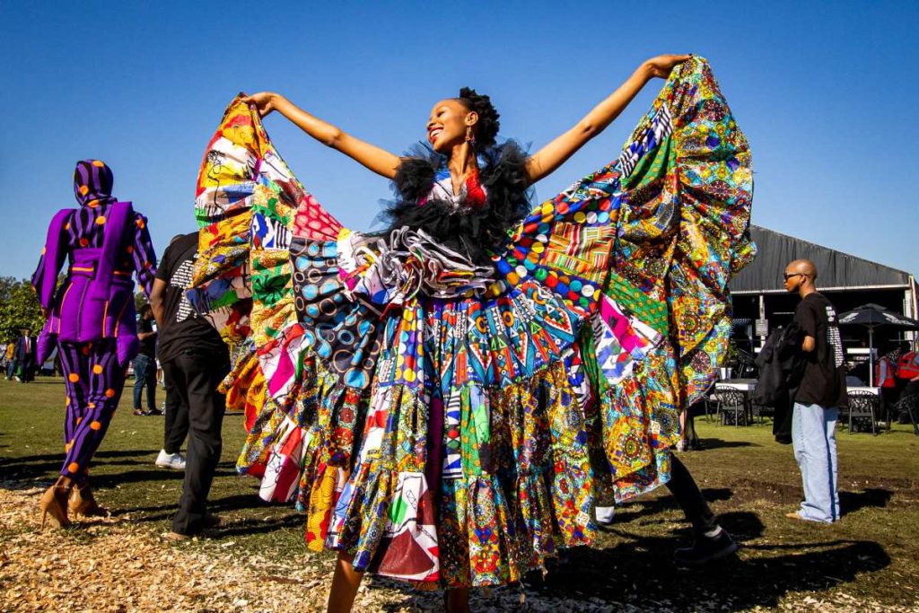 A woman wearing a colourful dress at the Durban July.